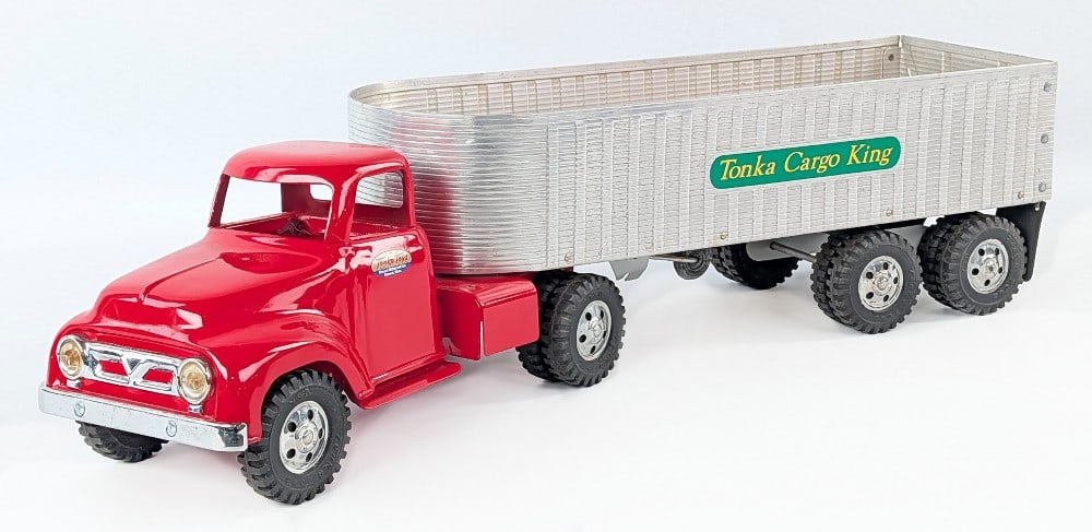 Restored Tonka Cargo King Truck and Trailer: Restored Tonka Cargo King truck and trailer. Overall a very nice restoration. The truck and trailer are in good condition with some light dust from display. Measures approximately 24" long.