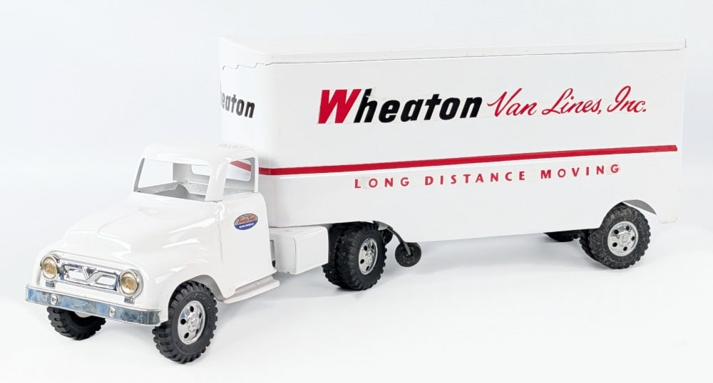 Custom Tonka Wheaton Van Lines Inc. Truck and Trailer: Custom Tonka Wheaton Van Lines Inc. truck and trailer. The truck has some pitting on the underside and both have some dust and wear from display. Overall a fairly nice restoration. Measures