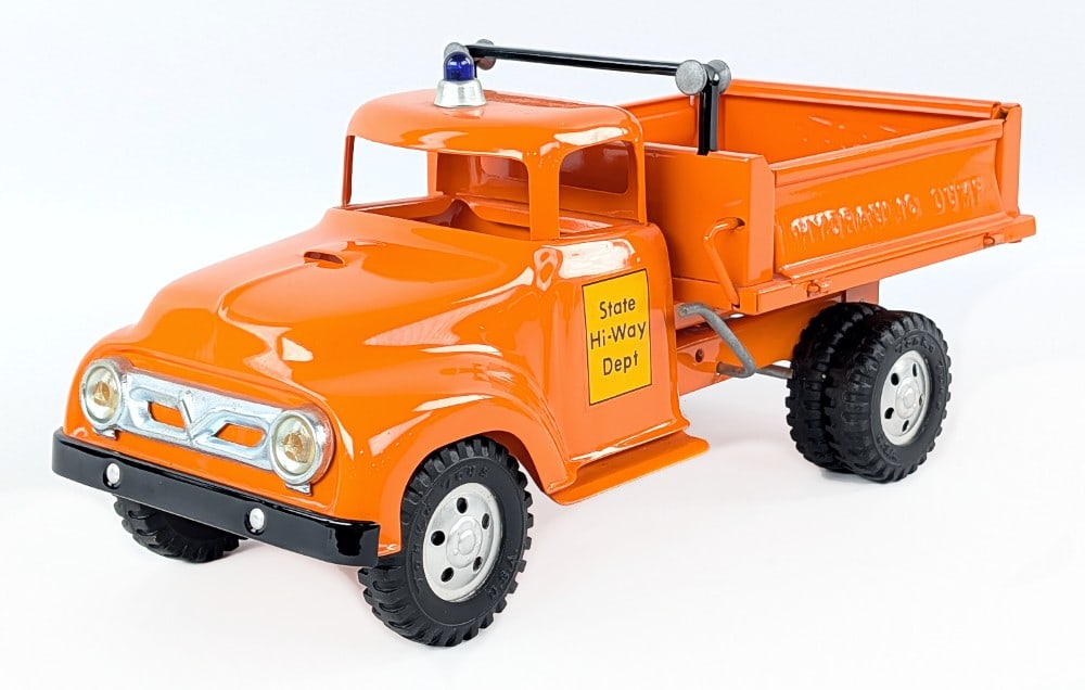 Restored Tonka State Hi-Way Dept. Hydraulic Dump Truck: Professionally restored Tonka State Hi-Way Dept. hydraulic dump truck. The truck has a working hydraulic dump bed with side gates that fold down and tailgate that opens. Good condition with some dust