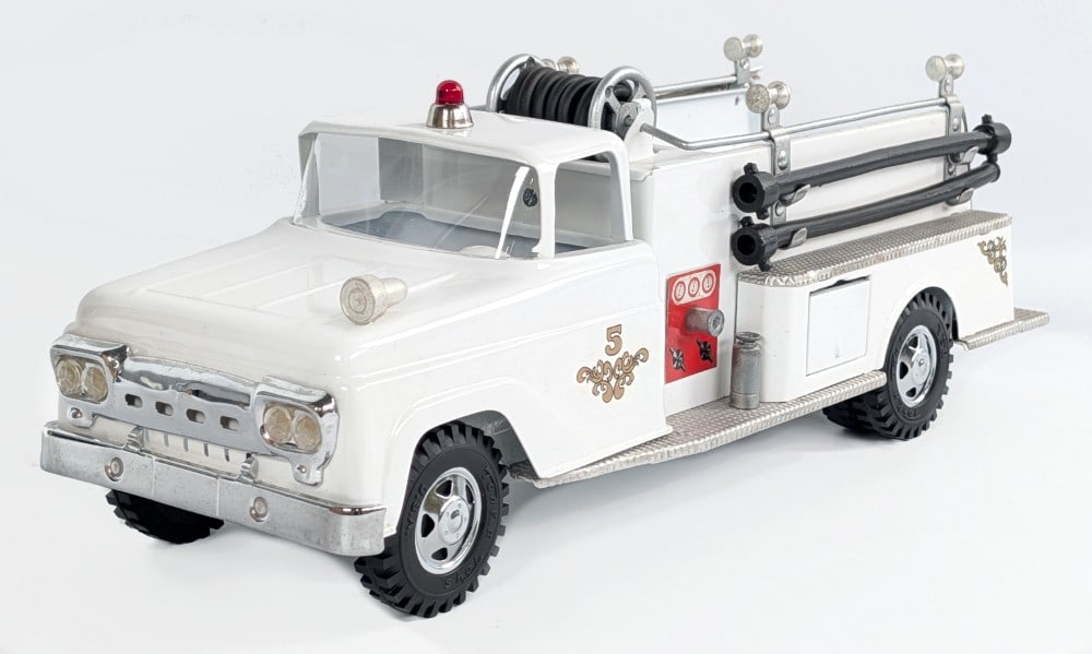 Restored White Tonka Suburban Pumper No. 5 Fire Truck: Restored white Tonka Suburban Pumper No. 5 fire truck. The truck has a very nice high quality restoration with new parts and a nice paint job. Good condition with some light dust from storage / displa