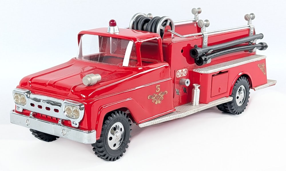 Restored Tonka Suburban Pumper No. 5 Fire Truck - Red: Restored Tonka square fender Suburban Pumper No. 5 fire truck. The truck has a nice restoration overall with new parts. The truck is in good condition and comes with the ladder and hoses. The truck is