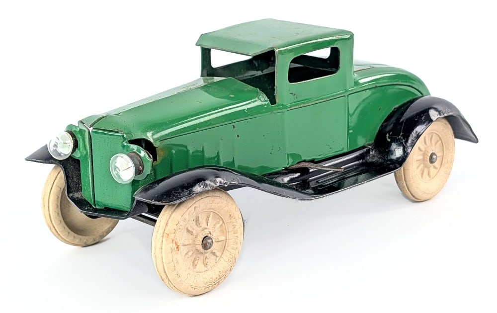Original Wyandotte Coupe w/ Electric Headlights: Original Wyandotte Coupe with electric headlights. The coupe shows some wear to the wheels and minor paint loss. Very good condition overall. Measures approximately 8-1/2" long.