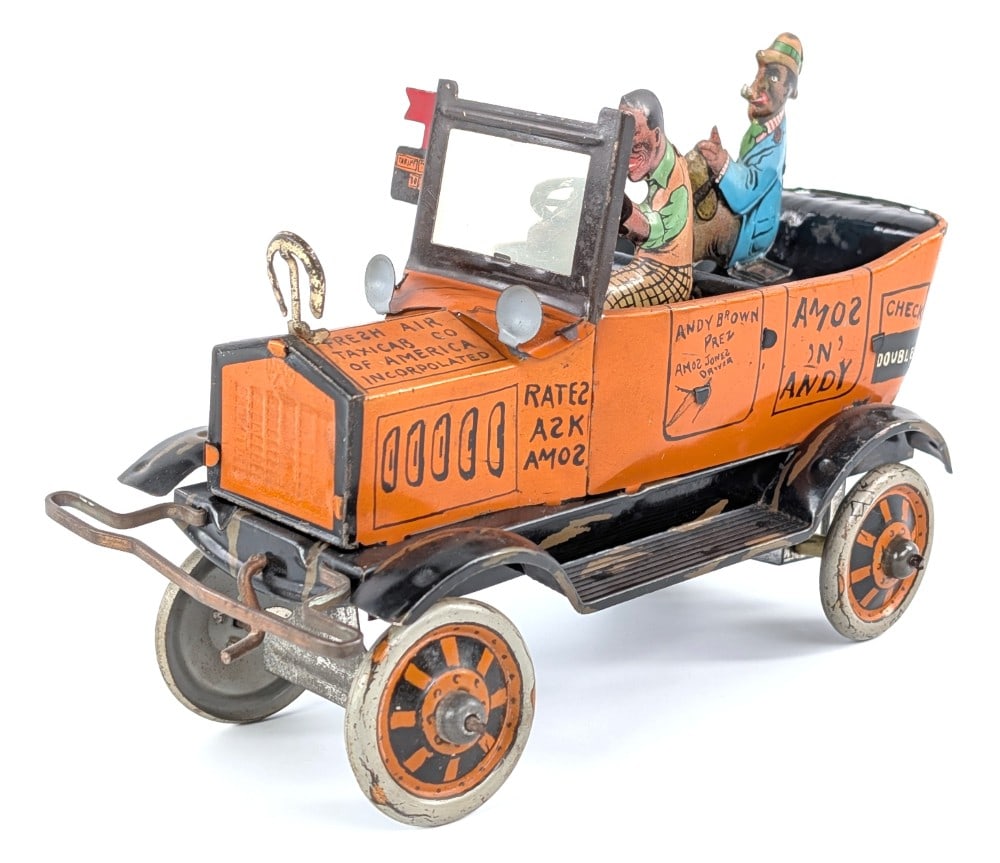 Marx Tin Windup Amos N Andy Fresh Air Taxi Cab: Marx tin windup Amos N Andy Fresh Air Taxi Cab. The windup mechanism works, but sometimes needs help to get it going. Displays well with great color and graphics. Overall very good condition and displ