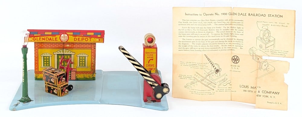 Marx Glendale Depot Railroad Station with Instructions: Marx tin Glendale Depot Railroad Station with original paper instructions. Very good original condition with some small knicks and scratches. Displays well with great colors and graphics. Measures app