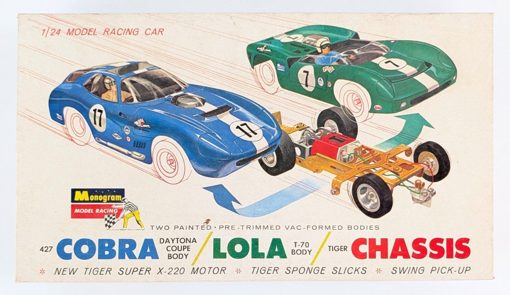 1/24 Monogram Model Racing Lola Body with Tiger Chassis: 1/24 scale Monogram Model Racing Lola T-70 body with Tiger Chassis. It is missing the Cobra plastic body, but the parts are unopened. The Lola body is dusty / dirty. The box shows some minor soiling f
