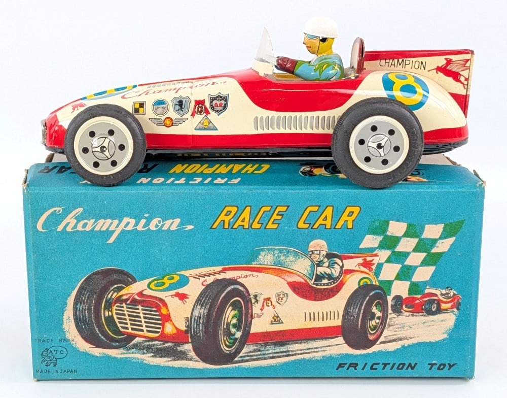 ATC Japan Tin Friction Champion Race Car w/ Box: Vintage ATC Japan tin friction Champion Race Car with original box. The car is in excellent condition. Displays well with Mobilgas Pegasus and other great graphics / colors. It still has the original 