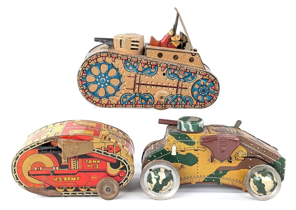 (3) Marx Tin Windup Army Tanks: (3) Marx tin litho windup army tanks. The one tank is missing its tracks. The tank missing its tracks works, the turnover tank does not, and the doughboy tank is missing the windup key. All showing a 