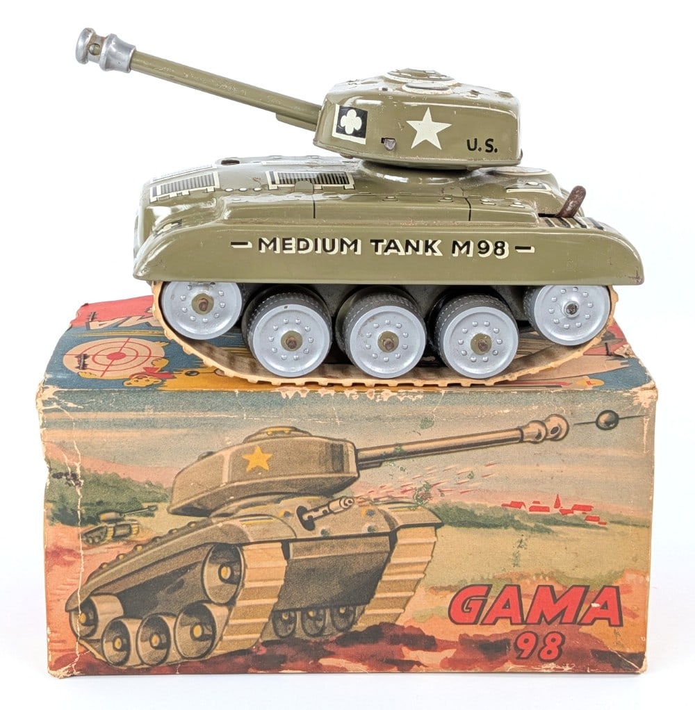 GAMA Tin Windup M98 Medium Tank with Box: Western Germany GAMA tin windup M98 Medium Tank with box. The tank works, but no key is included. The tracks are loose from age so they don't spin. It is missing the shells that it shoots. The box sho