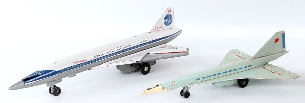 Pan American Supersonic Jet & Russian Jet: Japan tin battery operated Pan American Supersonic Jet and Russian tin Jet / aircraft. The one plastic wing on the Pan American is damaged. Both show some scratches and light play wear. Largest