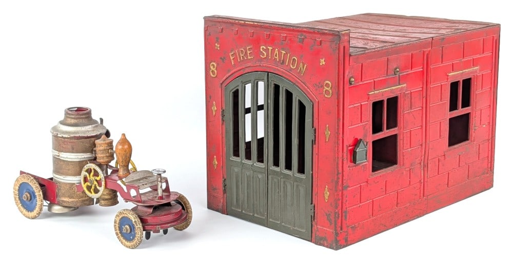 Kingsbury Fire Station with Fire Pumper Truck: Kingsbury Fire Station with Fire Pumper truck. The station has a windup clockwork mechanism that rings a bell and opens the station doors. A little sluggish but does function. The small green door on 