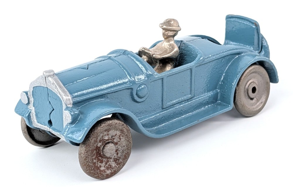 Kilgore Cast Iron Roadster with Rumble Seat: Kilgore cast iron roadster with rumble seat and driver. Restored condition. The wheels are loose. Measures approximately 6" long.