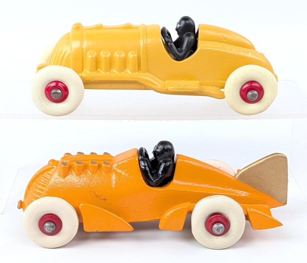 (2) Hubley Cast Iron Racer: (2) Hubley cast iron racers. Both are in restored condition with replacement wheels. Very good restored condition. Largest measures 6-3/4" long.