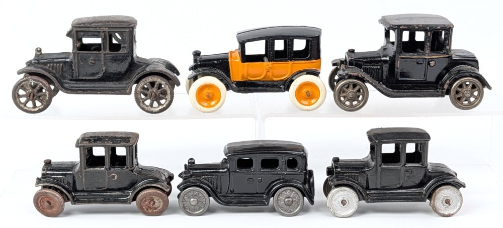 Arcade and AC Williams Cast Iron Coupe and Sedan: Arcade and AC Williams cast iron cars. Condition varies from original to restored. Some showing paint loss and wear from age. Largest measures approximately 5" long.