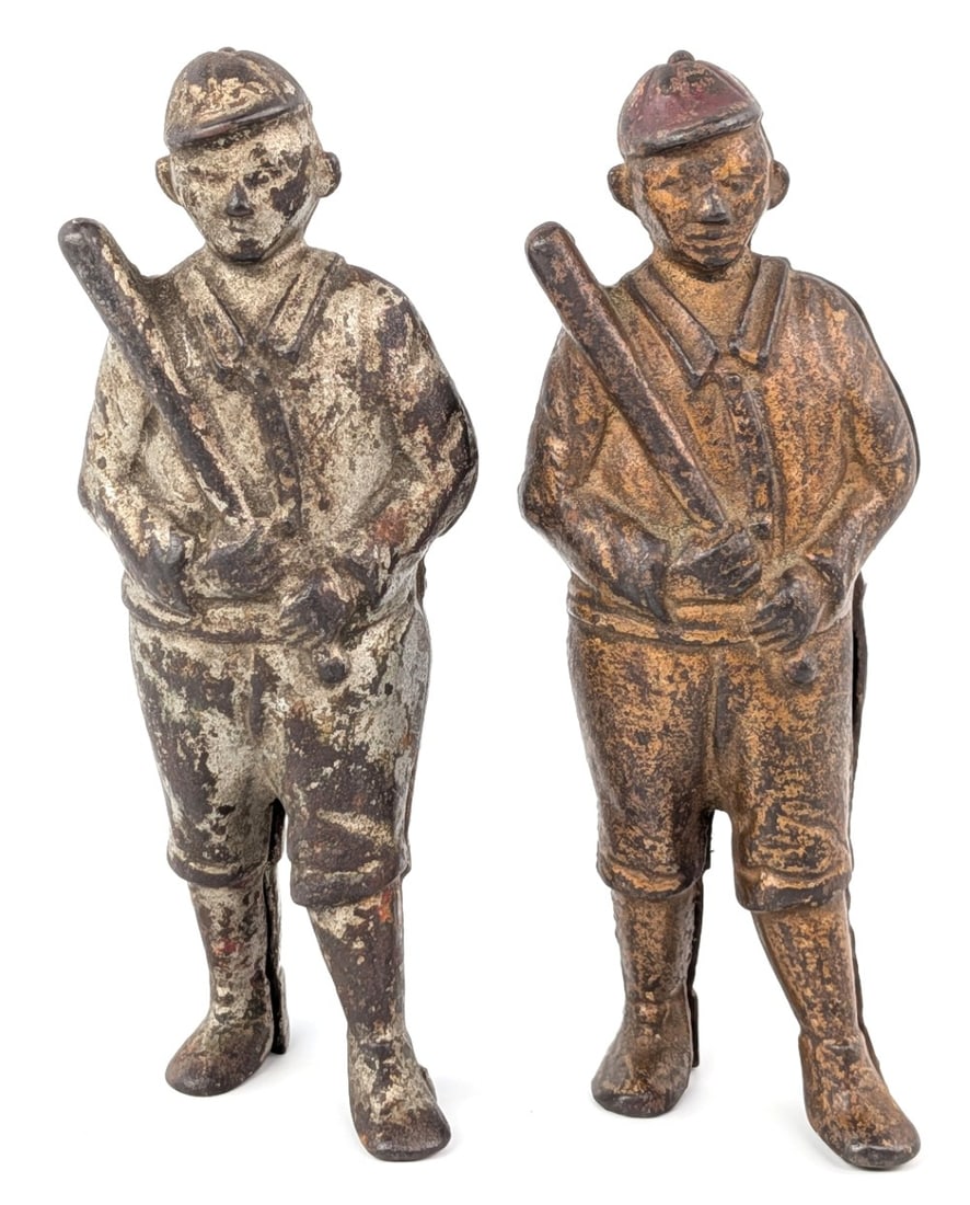 (2) AC Williams Cast Iron Baseball Player Still Banks: (2) AC Williams cast iron baseball player banks. The banks show paint loss and wear from age. Coin slot located on the back of the player. Each measures approximately 5-1/2" tall.?