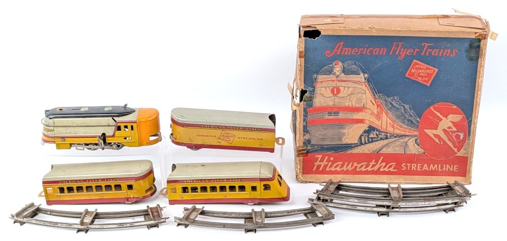 American Flyer Hiawatha Windup Train Set with Box: American Flyer O Gauge Hiawatha Chicago Milwaukee St. Paul Pacific train set with the original box. Windup on the locomotive works. Comes with the curved track. Box has wear and tear from handling and