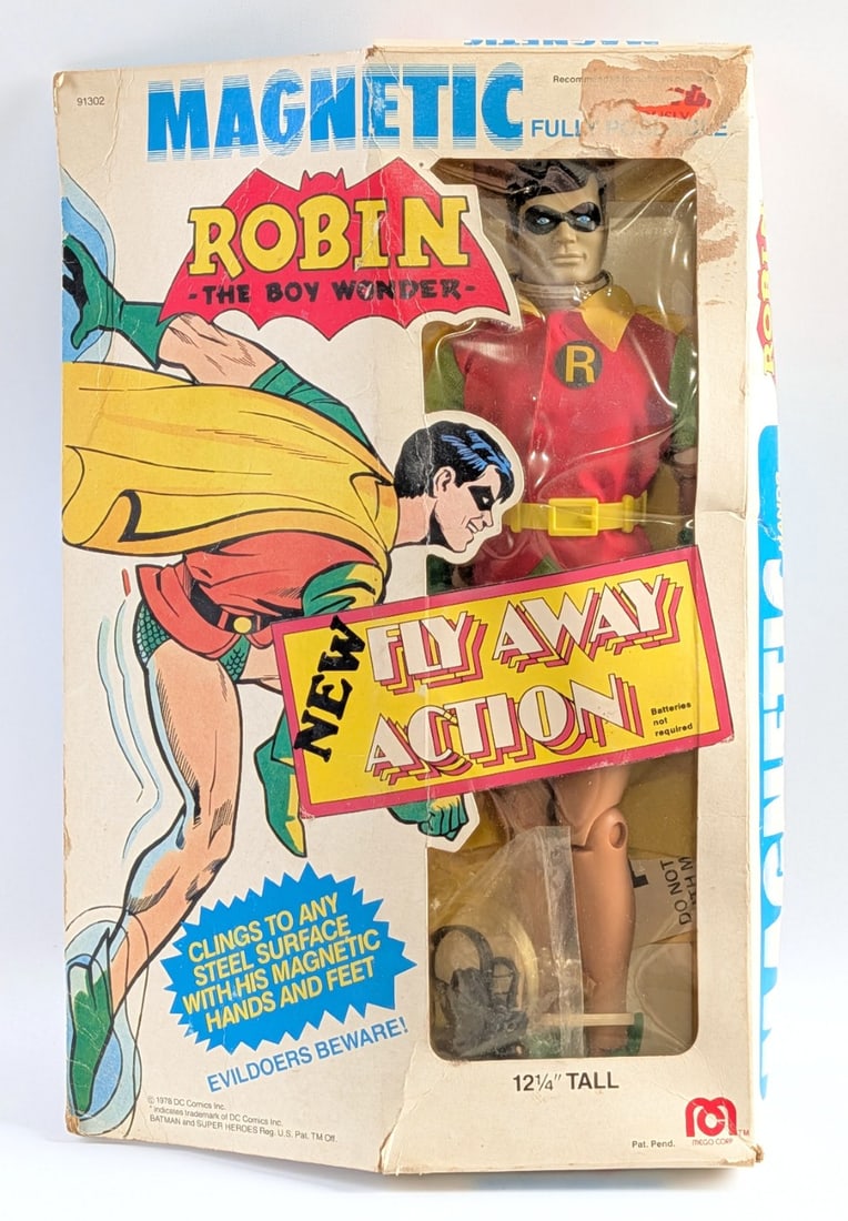Vintage MEGO Magnetic Robin Fly Away Action Figure: Vintage MEGO Magnetic Robin Fly Away Action figure in the original package. The figure is in very good condition. The package shows some staining, crushing, and wear from age and storage.?