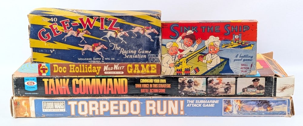 Ideal Tank Commander, Torpedo Run, Sink The Ship, Doc Holiday, and Gee-Wiz Games: Vintage Ideal Tank Commander, Milton Bradley Torpedo Run, Transogram Company Sink The Ship, Transogram Doc Holliday Wild West game, and Sunny Andy Gee-Wiz horse racing game. Games appear to have been 