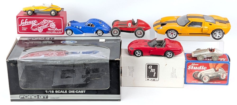 Schuco Windup Racers, Dodge Viper, and 1/18 Ford GT: Schuco windup race cars, Dodge Viper promo car, and 1/18 die-cast Ford GT. All are dusty / dirty from display. Some come with the original packaging.?