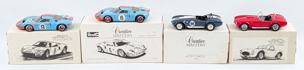 1/20 Scale Ford GT40 and Shelby Cobra 427 Die-Cast Cars: 1/20 scale Ford GT40 and Shelby Cobra 427 die-cast cars. The cars are very dusty / dirty from being on display.?