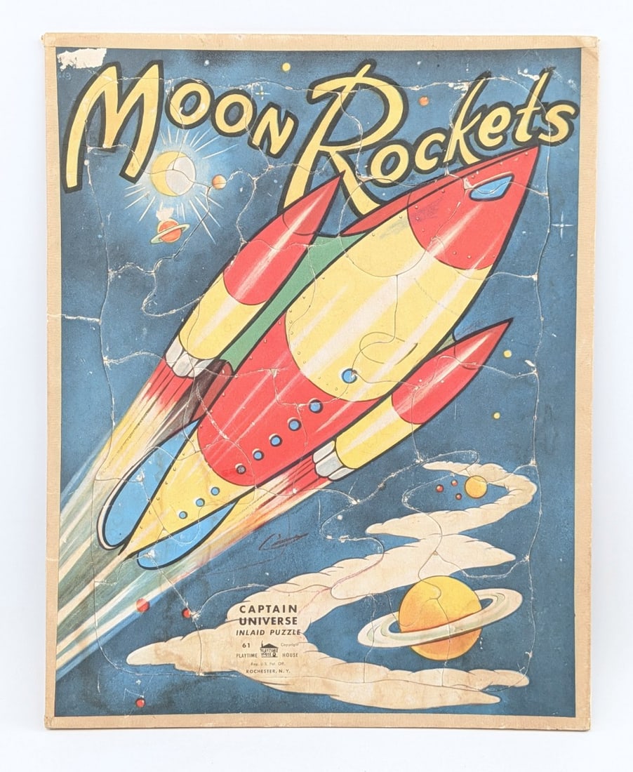 Vintage Playtime House Moon Rockets Puzzle: Vintage Playtime House Moon Rockets puzzle. Good condition with some peeling and age wear. Overall measures approximately 14" tall by 11" across.?