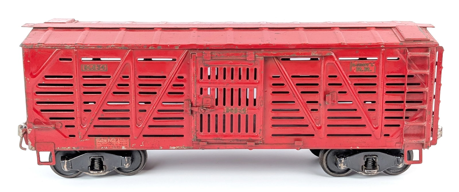 Original Buddy L Outdoor Railroad Cattle Car: Original Buddy L Outdoor Railroad cattle / livestock train car. Solid paint and decals. Showing some loss and age wear. Overall a nice example and displays very well overall. Measures approximately 21