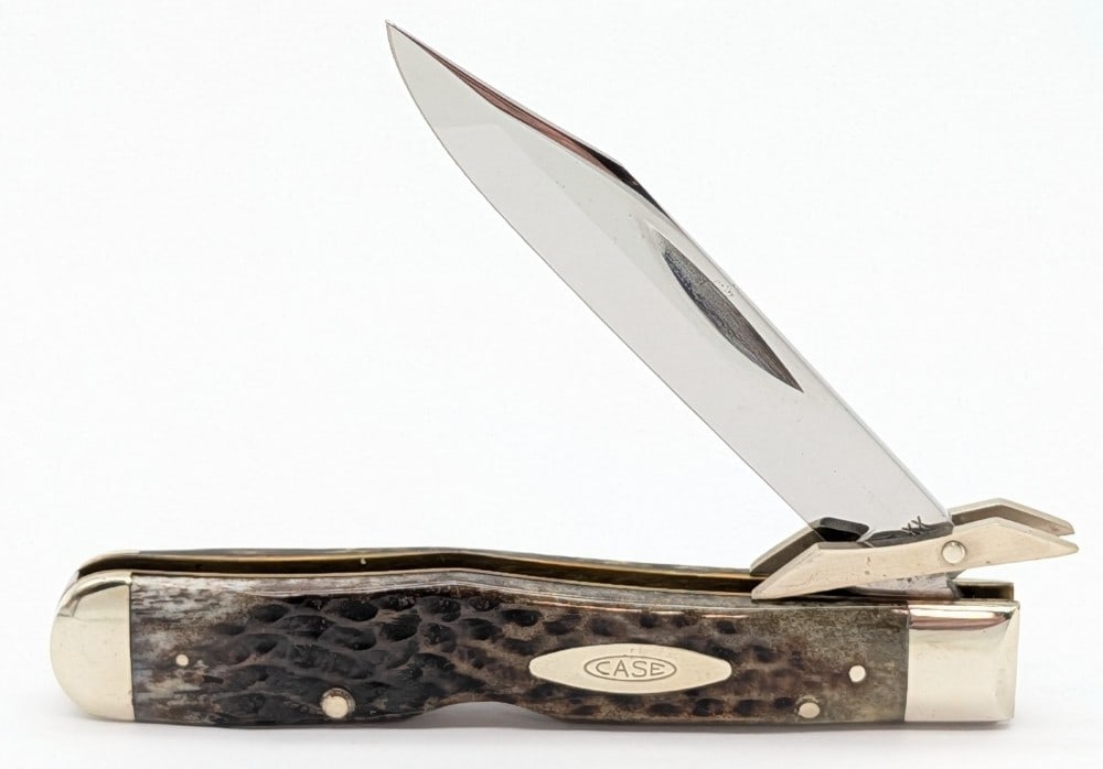 1977 Case XX Jigged Bone Cheetah 6111 1/2: Knife is in very nice condition with a great blade, and light scuffs on the bolsters from handling. Overall measures 4-3/8in when closed.