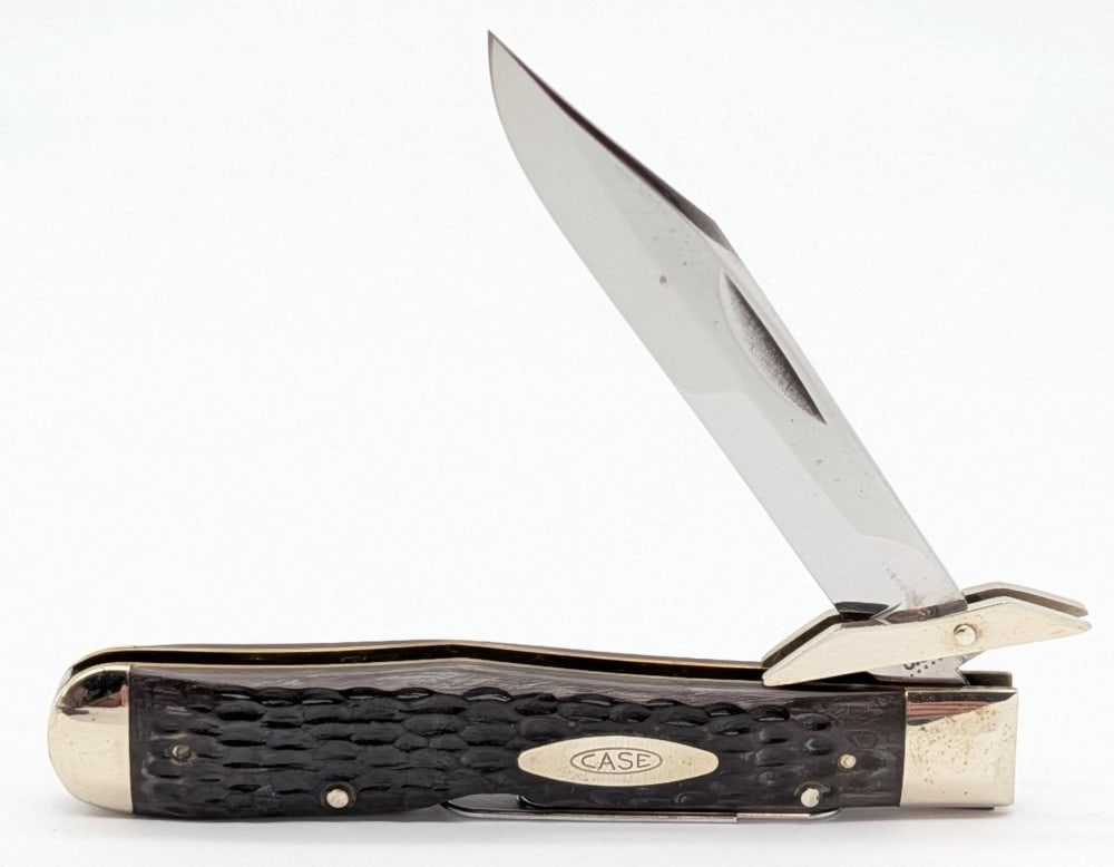 1974 Case XX Jigged Delrin Cheetah 6111 1/2: Knife is in nice condition with some scuffs and tarnishing on the bolsters from handling and age. Overall measures 4-3/8in when closed.