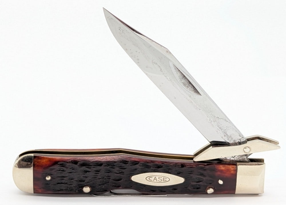 1973 Case XX Jigged Pretty Bone Cheetah 6111 1/2: Knife is in nice condition with some cleaned pits on the blade, and light scuffs on the bolsters from handling. Overall measures 4-3/8in when closed.