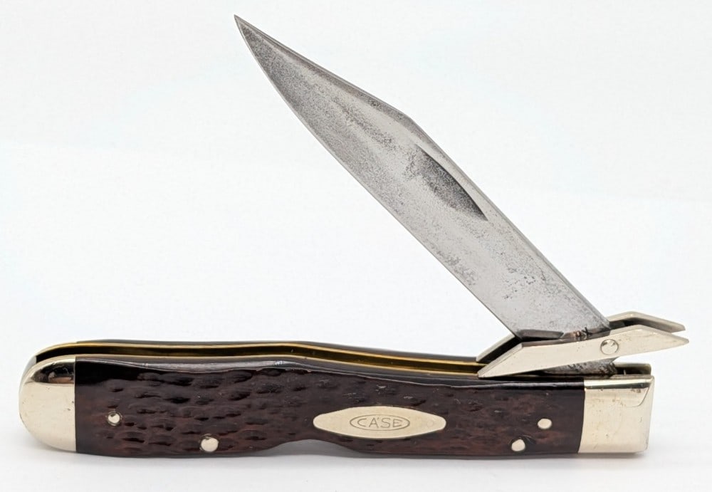 1974 Case XX Jigged Bone Cheetah 6111 1/2: Knife is in good used condition with material loss and pitting on the blade, scuffs and some tarnishing on the polished bolsters, and nice handle scales. Overall measures 4-3/8in when closed.