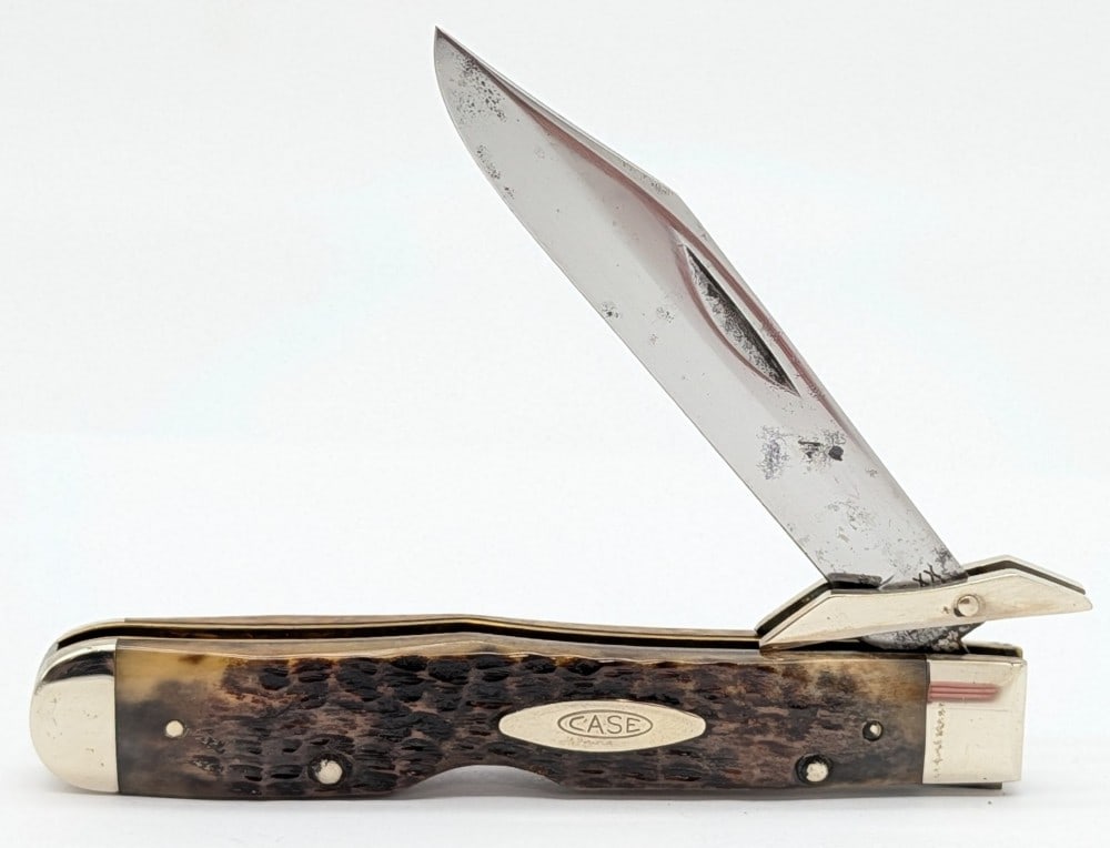 1980 Case XX Jigged Bone Cheetah 6111 1/2: Knife is in good aged condition with pitting and carbon spots on the polished blade, some scuffs on the bolsters, and nice handle scales. Overall measures 4-3/8in when closed.