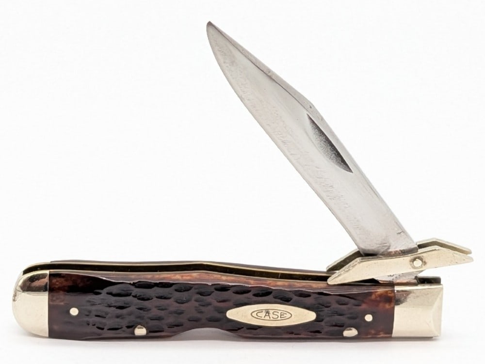 1972 Case XX Jigged Bone Cheetah 6111 1/2: Knife is in used condition with some heavy scratches and material loss on the blade, some heavy dings on the guard, light scuffs on the bolsters, and nice handle scales. Overall measures 4-3/8in when 