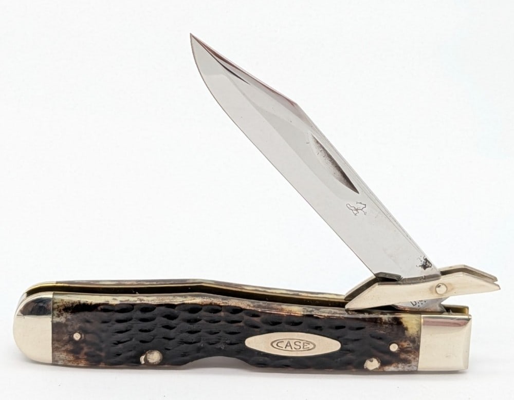 1977 Case XX Jigged Pretty Bone Cheetah 6111 1/2: Knife is in very nice condition with some carbon spots on the blade, light scuffs on the bolsters, and nice handle scales. Overall measures 4-3/8in when closed.