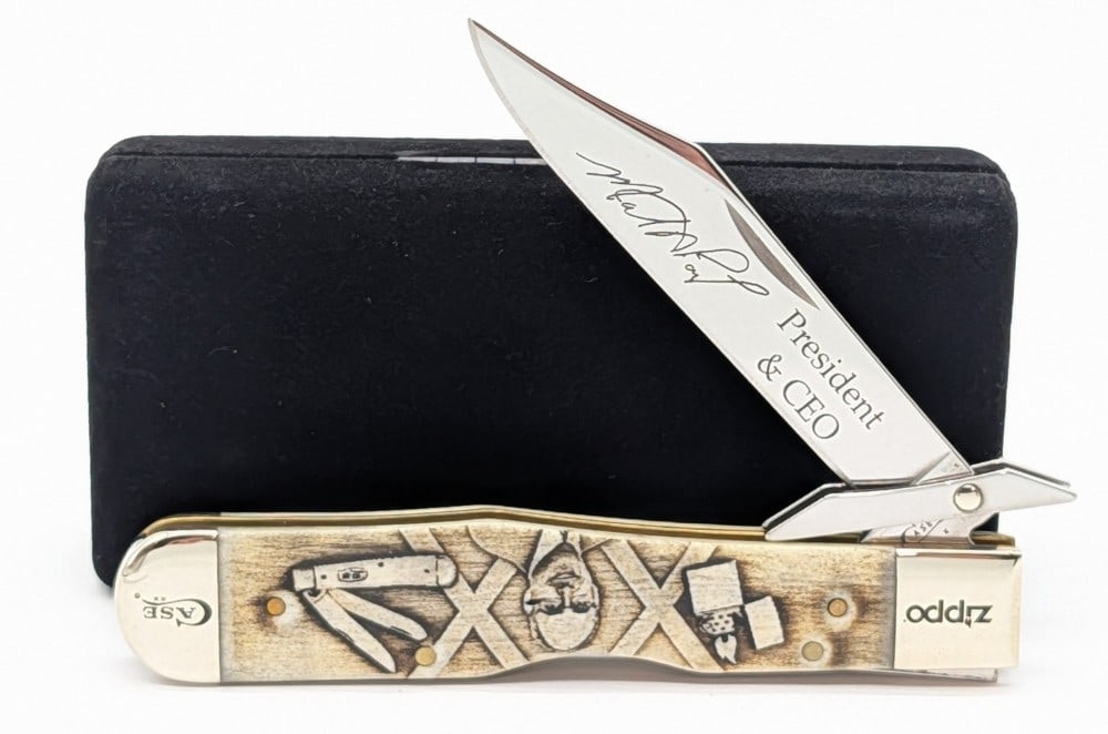 2016 Case XX Zippo President Natural Bone Cheetah 6111 1/2: Knife is in very nice condition with light scuffs on the bolsters from handling. Overall measures 4-3/8in when closed.