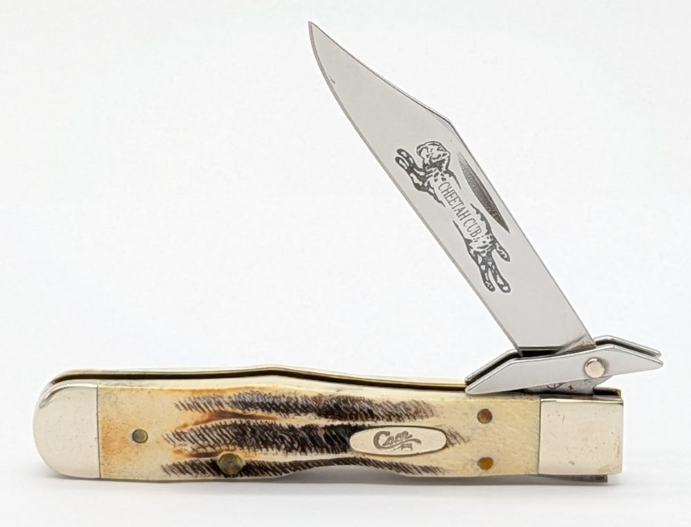1st Run 2005 Case XX Bone Stag Cheetah Cub 6.511 1/2: Knife is in very nice condition with light scuffs and some tarnishing on the bolsters from handling. Overall measures 3-1/2in when closed.