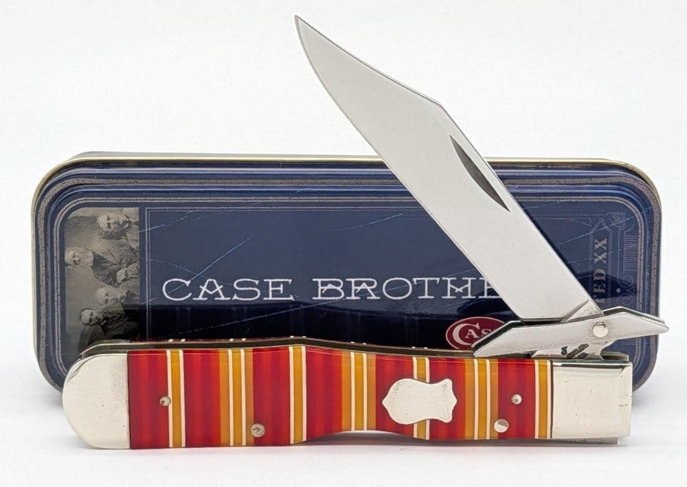 2003-07 Case Brothers Candy Stripe Celluloid Cheetah R111 1/2: Knife is in very nice condition with light scuffs and tarnishing on the bolsters from handling. Overall measures 4-3/8in when closed.