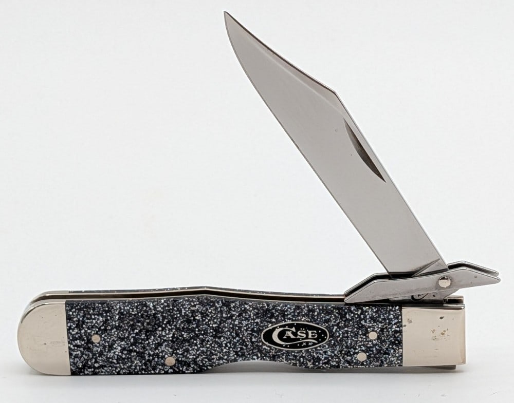 2019 Case XX Star Dust Kirinite Cheetah 10111 1/2: Knife is in very nice condition with some light tarnishing on the bolsters from handling. Overall measures 4-3/8in when closed.