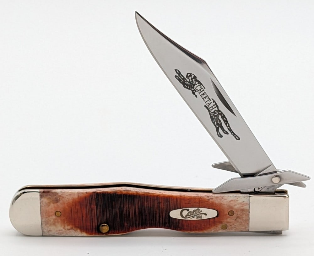 2016 Case XX Sawcut Caramel Bone Cheetah 6111 1/2: Knife is in very nice condition with some light tarnishing on the bolsters from handling. Overall measures 4-3/8in when closed.