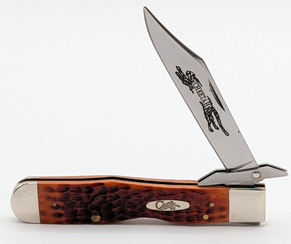2019 Case XX Chestnut Bone Cheetah 6111 1/2: Knife is in very nice condition with light scuffs and tarnishing on the bolsters from handling. Overall measures 4-3/8in when closed.