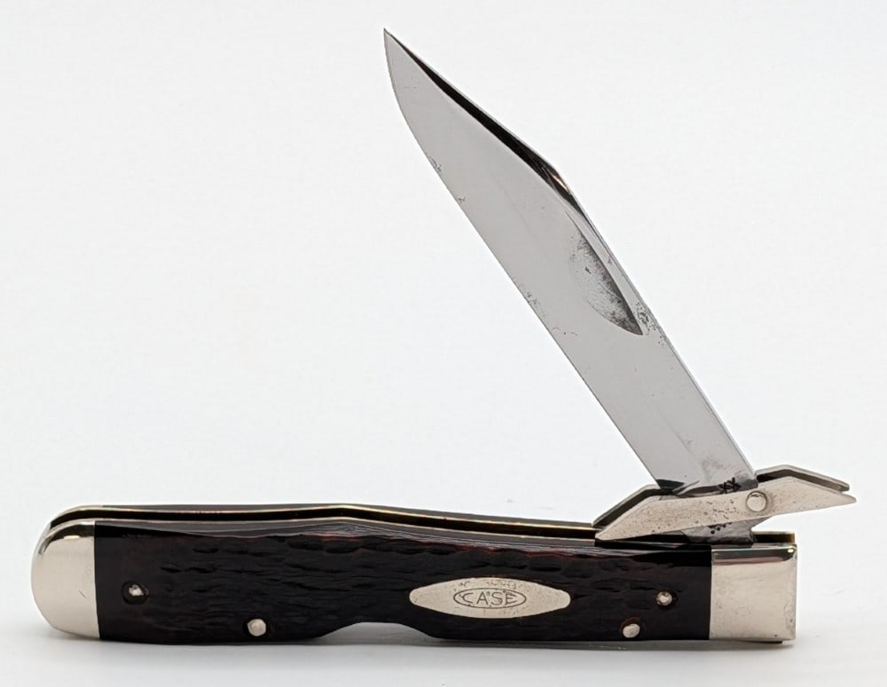 1975 Case XX Jigged Bone Cheetah 6111 1/2: Knife is in nice aged condition with some carbon spots and pits on the blade, scuffs and tarnishing on the polished bolsters, and nice handle scales. Overall measures 4-3/8in when closed.