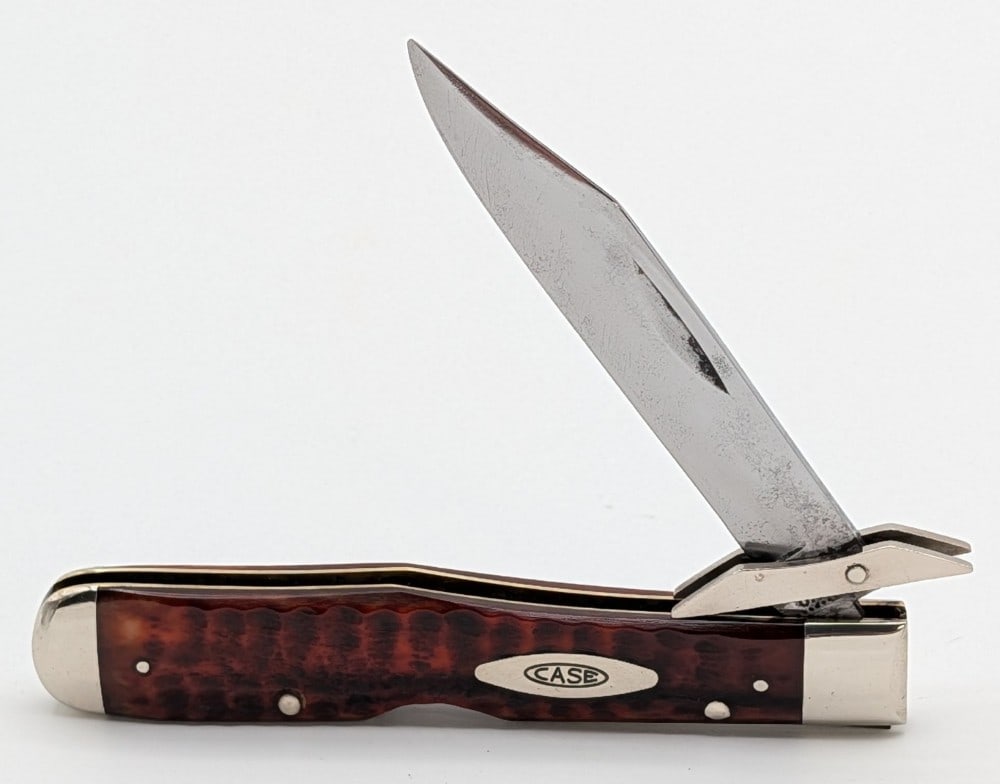1970 Case XX Jigged Pretty Bone Cheetah 6111 1/2: Knife is in used cleaned condition with heavy scratches and pits on the cleaned blade, scuffs and dings on the polished bolsters, and nice handle scales. Overall measures 4-3/8in when closed.