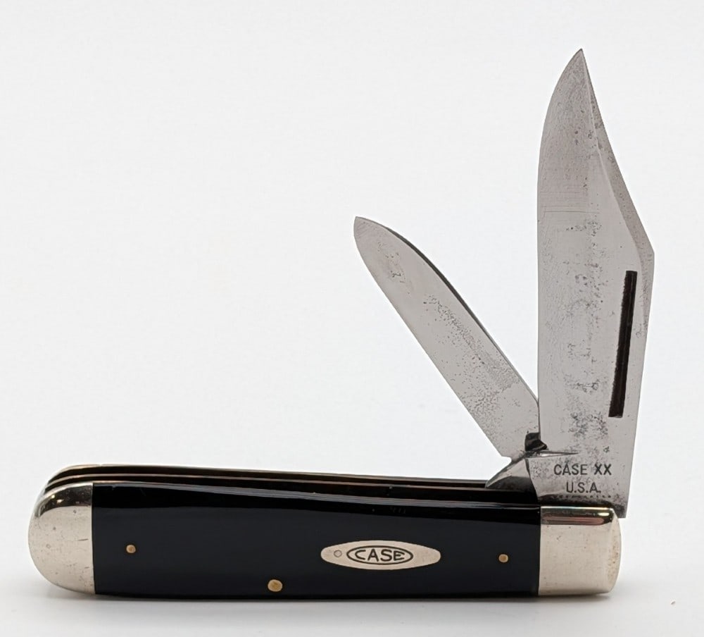 1970 Case XX Slick Black Long Pull Swell End Jack Knife 31SAB: Knife is in good cleaned condition with with scratches and carbon spots on the polished blades, light scuffs on the polished bolsters, and nice handle scales. Overall measures 3-3/4in when closed.