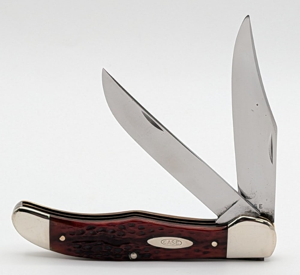 1940-64 Case XX Red Bone Folding Hunter 6265: Knife is in nice cleaned condition with traces of scratches and pits on the polished blades, light scuffs on the polished bolsters, and nice handle scales. Overall measures 5-1/4in when closed.