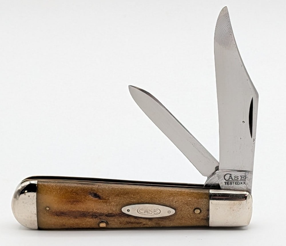 1920-40 Case Tested XX Stag Uneven Jack Knife: Knife is in nice cleaned condition with light material loss and scratches on the polished blades, light scuffs on the polished bolsters, and a pin crack on the back handle scale bottom pin. Overall me