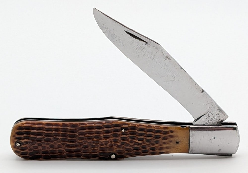 1905-20 Case Bradford Green Bone Coke Bottle 61050: Knife is in used cleaned condition with heavy scratches and material loss on the polished blade, scratches and dings on the polished bolsters, and a small chip on the edge of the front handle scale. O