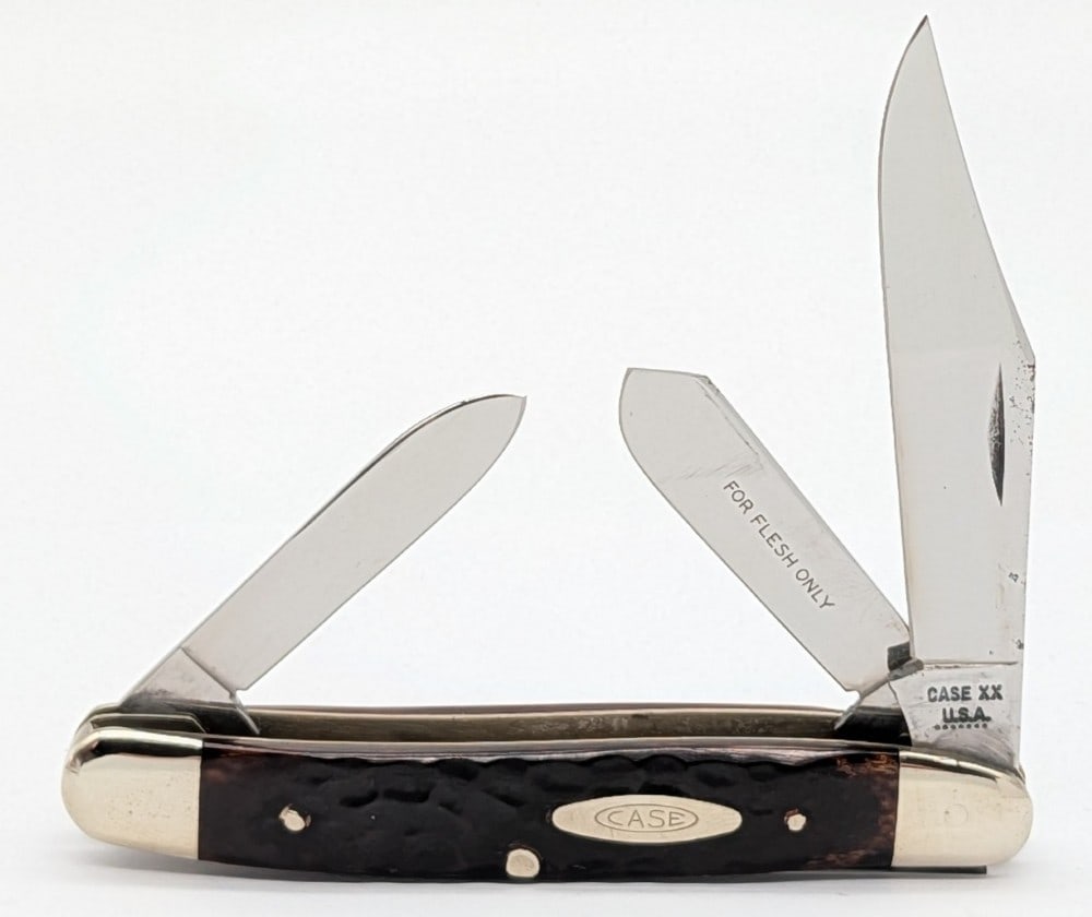 1973 Case XX Jigged Pretty Bone Medium Stockman 6347: Knife is in nice condition with some light scuffs and carbon spots on the blades, light scuffs on the polished bolsters, and nice handle scales. Overall measures 3-7/8in when closed.