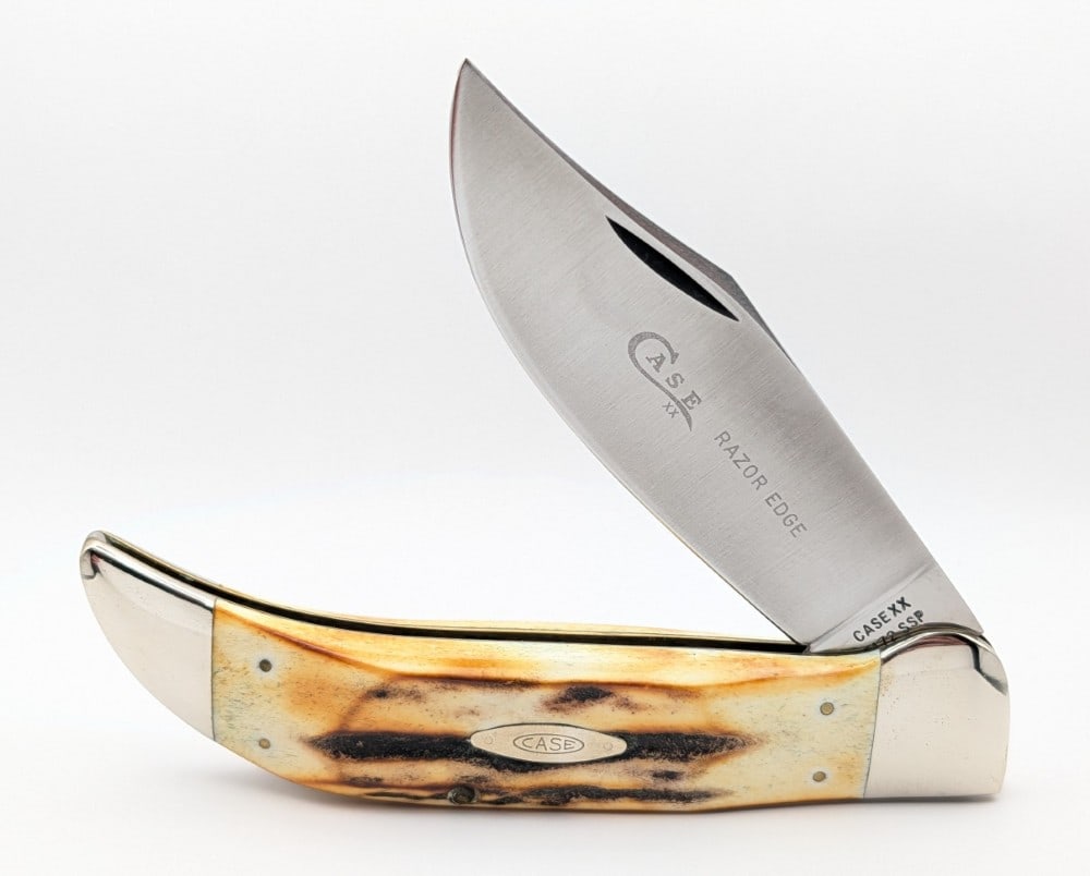 1976 Case XX Gray Letter Stag Large Folding Clasp 5172: Knife is in very nice condition with light scuffs and tarnishing on the bolsters from handling. Overall measures 5-3/8in when closed.