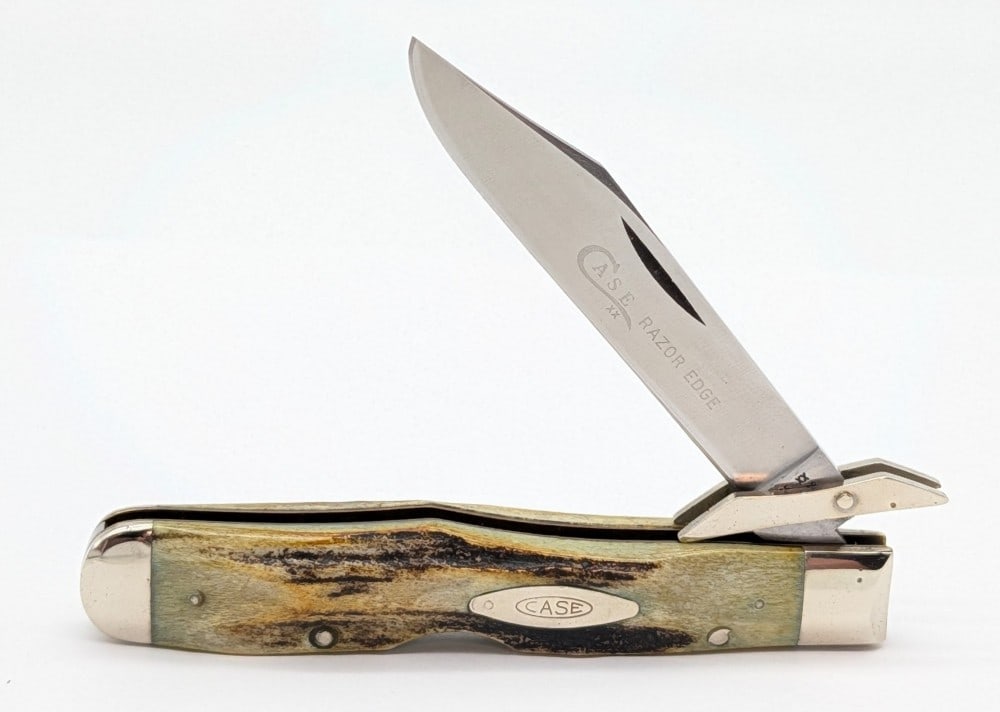 1976 Case XX Gray Letter Stag Cheetah 5111 1/2: Knife is in very nice condition with light scuffs and tarnishing on the bolsters from handling. Overall measures 4-3/8in when closed.