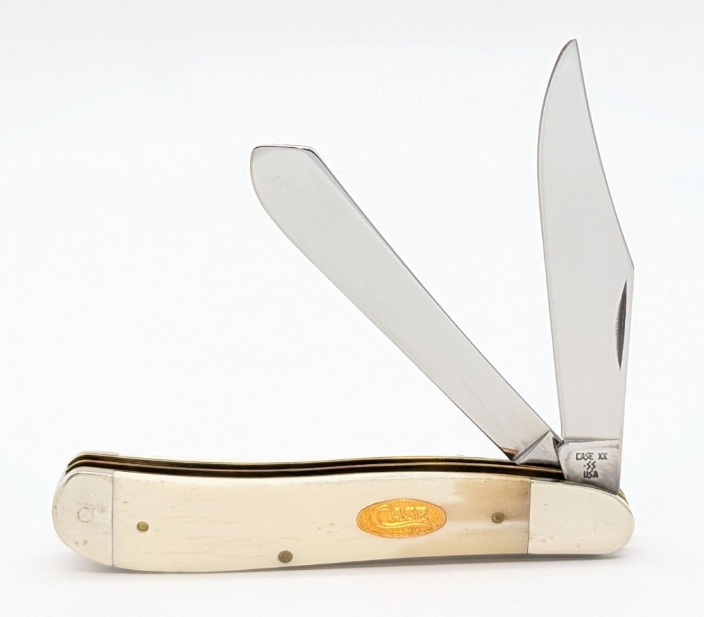 1989 Case XX Natural Bone Dogleg Jack Knife W240: Knife is in very nice condition with light tarnishing on the bolsters from age. Overall measures 4-1/2in when closed.