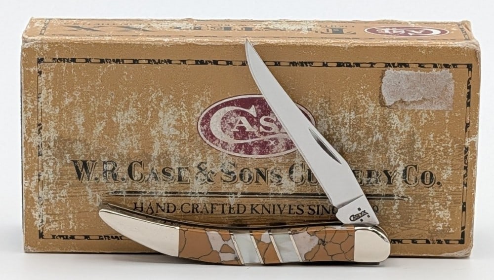 2007 Case XX Exotic Snow Leopard Tiny Toothpick EX10096 w/ Case: Knife is in like new condition. Overall measures 3in when closed.