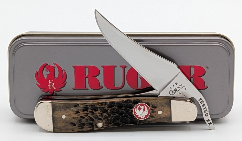 2004 Case XX Ruger Jigged Bone Russlock 61953L w/ Tin: Knife is in like new condition. Overall measures 4in when closed.